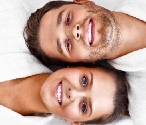 Close-up black and white portrait of a loving couple demonstrating affection and connection.
